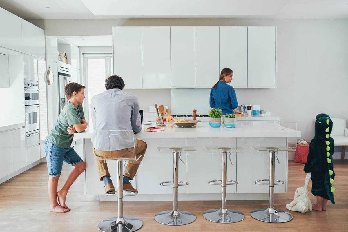 Family Couple and Girl Having Breakfast Together