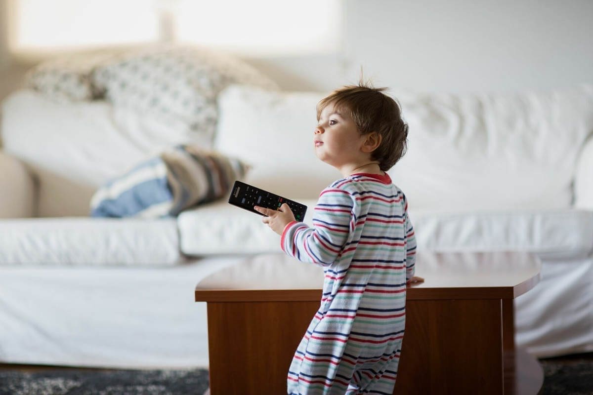 Boy Holding Device Remote