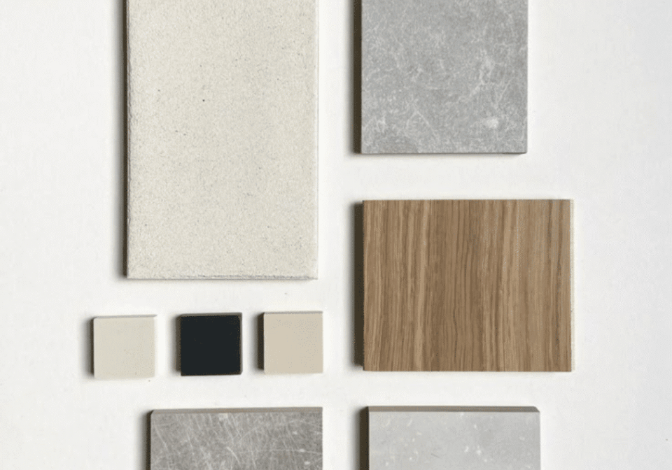 Assorted tiles and samples on white background.