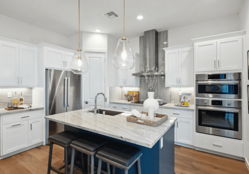 Modern kitchen with island and pendant lights. Modern kitchen with island and pendant lights.